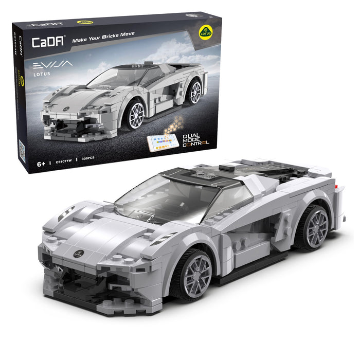 Model car made of building blocks in front of its packaging