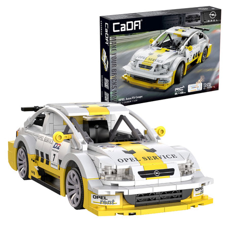 Model car built from interlocking bricks with Opel branding, next to its packaging.