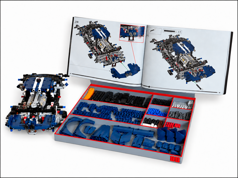 A LEGO Technic model kit set displayed on a white background, featuring a partially assembled blue and white mechanical model, an open instruction booklet showing the engine diagram, and an open storage tray filled with blue, black, and gray LEGO parts.